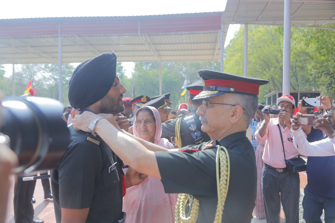 Lt Gen Manoj Mukund Narayana, PVSM, AVSM, SM, VSM, GOC-in-C, Eastern Command pipping a Gentlemen Cadet from Special Commissioned Officer’s Course at OTA, Gaya on 08 Jun 2019