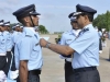 Air Chief Marshal NAK Browne awarding the  ‘Stripes’ and ‘Wings’ to the newly commissioned Flying Officers during the Pipping Ceremony 