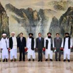 China Afghan Taliban Awkward Embrace
